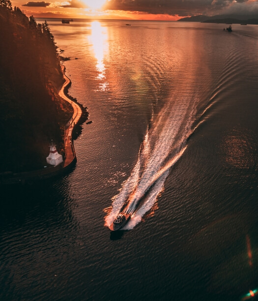 sunset aerial view of speed boat