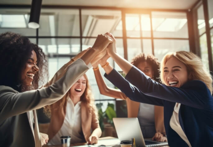 blossom women celebrating success teamwork